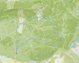 Carte d'un parcours VTT autour de Pertuis, traversant des villages comme La Tour-d'Aigues et Grambois, avec des reliefs marqués.